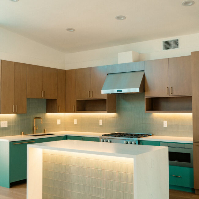Kitchen Renovation – Green Island and Wood Cabinets – RODO Development INC