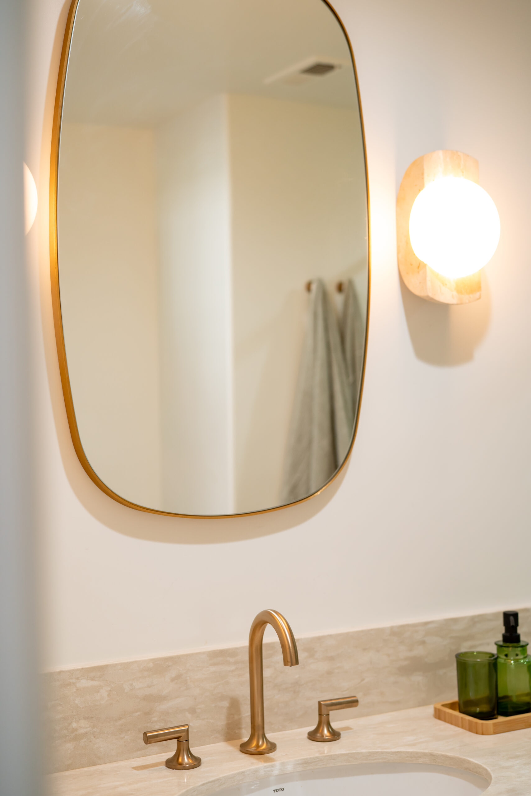 Bathroom Renovation – Mirror and Faucet Upgrade – RODO Development INC